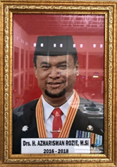 Drs. H. AZHARISMAN ROZIE M.Si